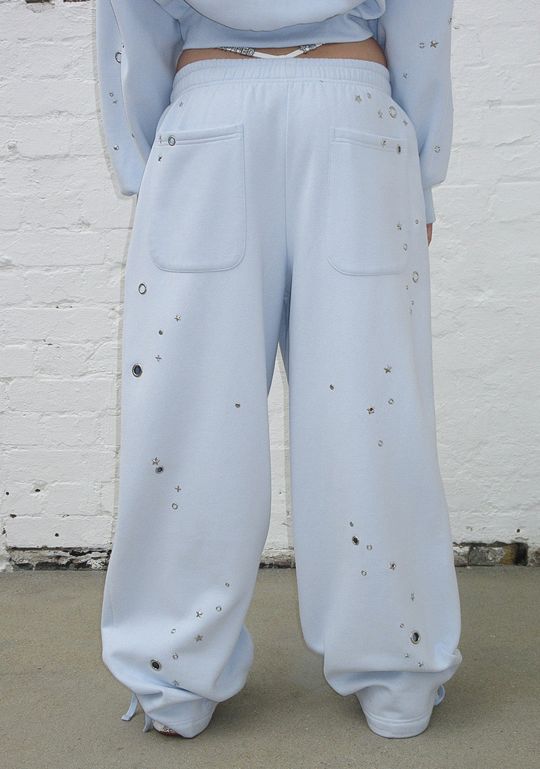 FREE SH!T: GLITCH EYELET OVERSIZED SWEATPANTS BABY BLUE