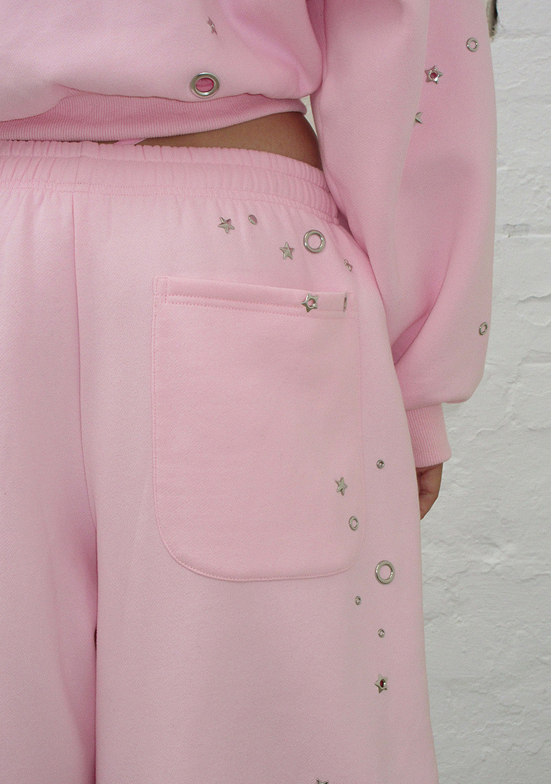 FREE SH!T: GLITCH EYELET OVERSIZED SWEATPANTS BABY PINK