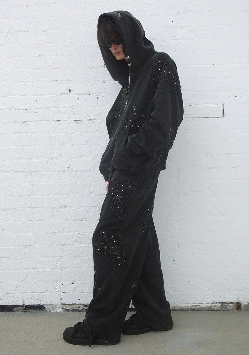 SINNER STUDDED OVERSIZED SWEATPANTS BLACK VINTAGE WASH