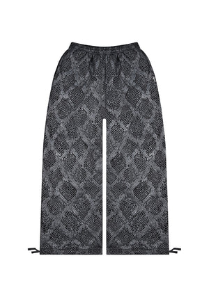NOCTURNAL SNAKESKIN TEXTURED OVERSIZED SWEATPANTS BLACK