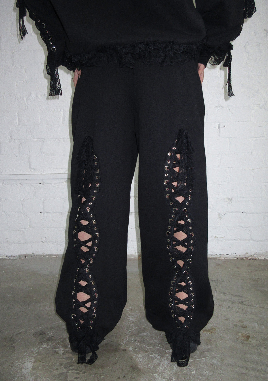 BAD ROMANCE LACE RIBBON OVERSIZED SWEATPANTS BLACK