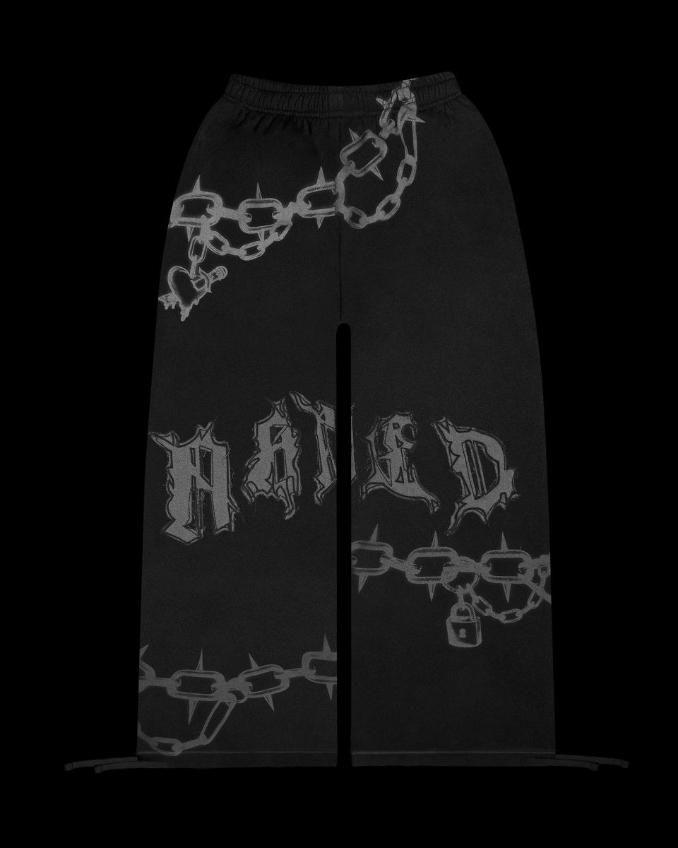 Two dimensional Chains oversized sweatpants black on a black background.