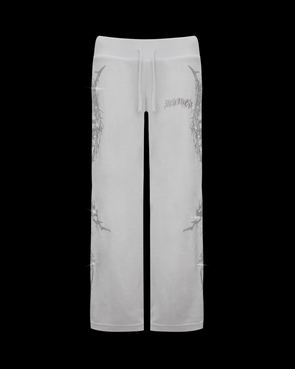 CURSE RHINESTONE VELOUR SWEATPANTS SALT by NAMED COLLECTIVE® with drawstring waist and metallic silver thorn details.
