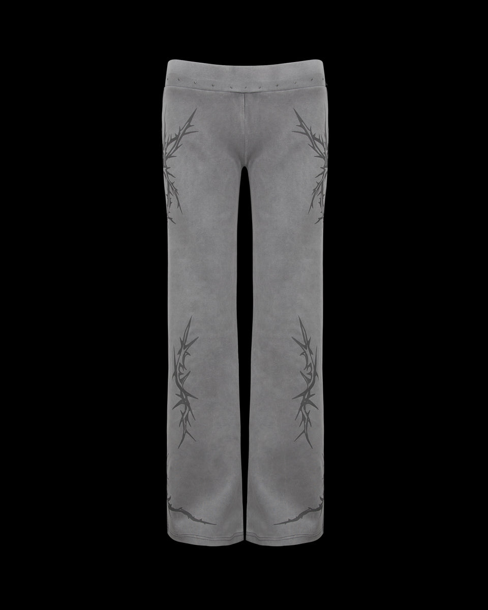 NAMED COLLECTIVE® CURSE SCULPT STRETCH PANTS WASHED GREY with black abstract graphics on the thighs and legs.