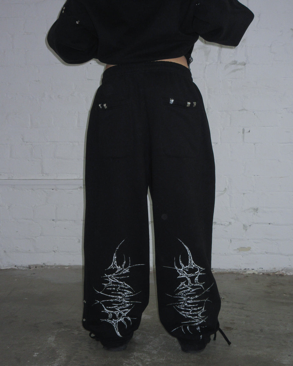 DESTROY CHROME PIERCED OVERSIZED SWEATPANTS BLACK