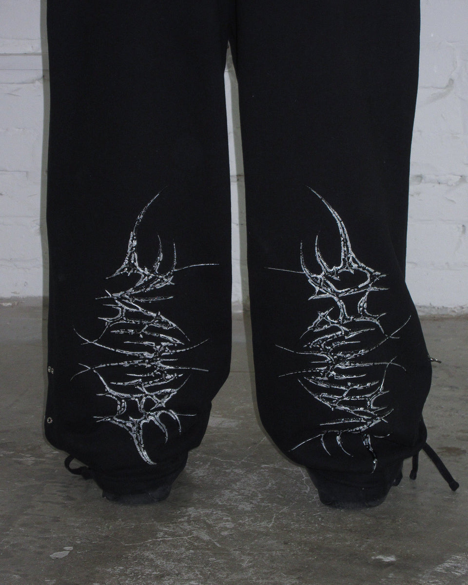 DESTROY CHROME PIERCED OVERSIZED SWEATPANTS BLACK