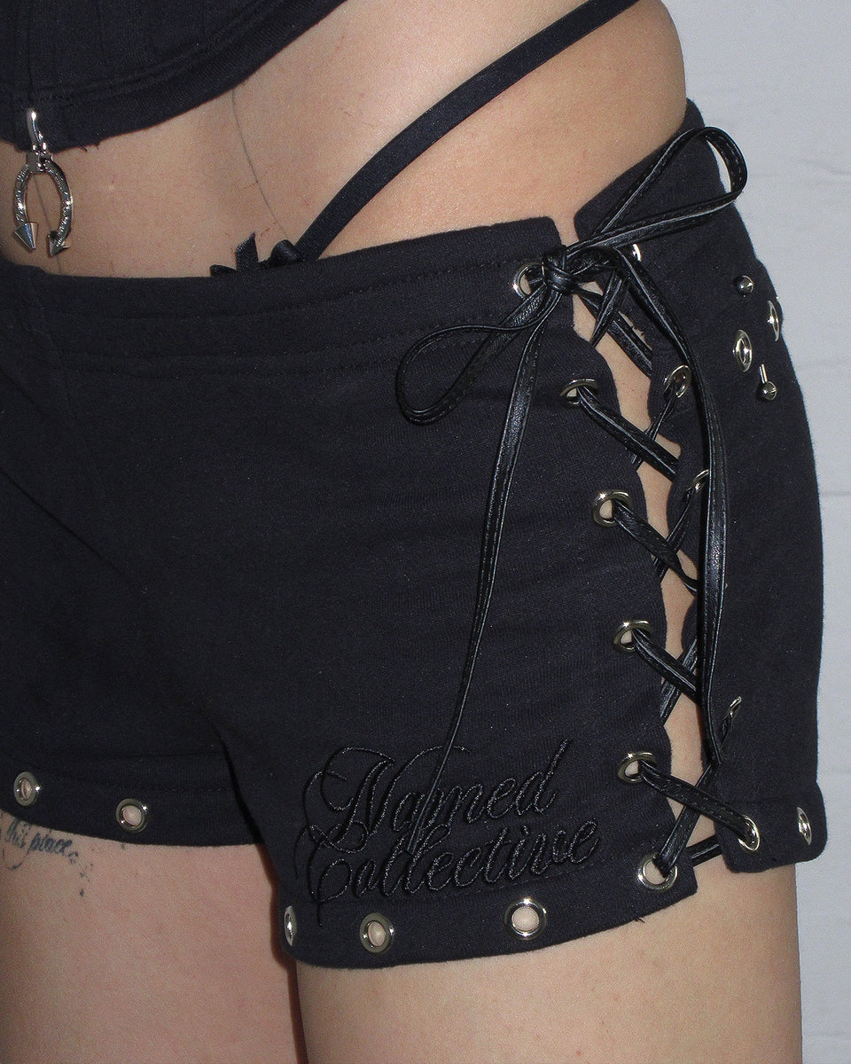 DESTROY PIERCED CORSET HOTPANT SHORTS BLACK