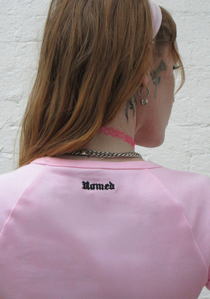 DON'T FALL IN LOVE RHINESTONE BABY TEE BABY PINK