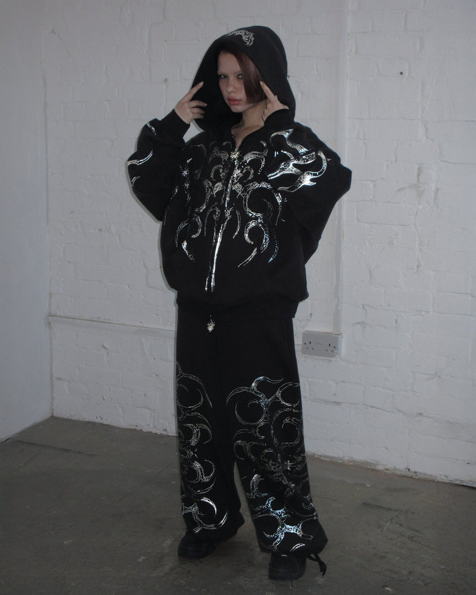 EUPHORIA DISTRESSED PRINT CHROME OVERSIZED SWEATPANTS BLACK