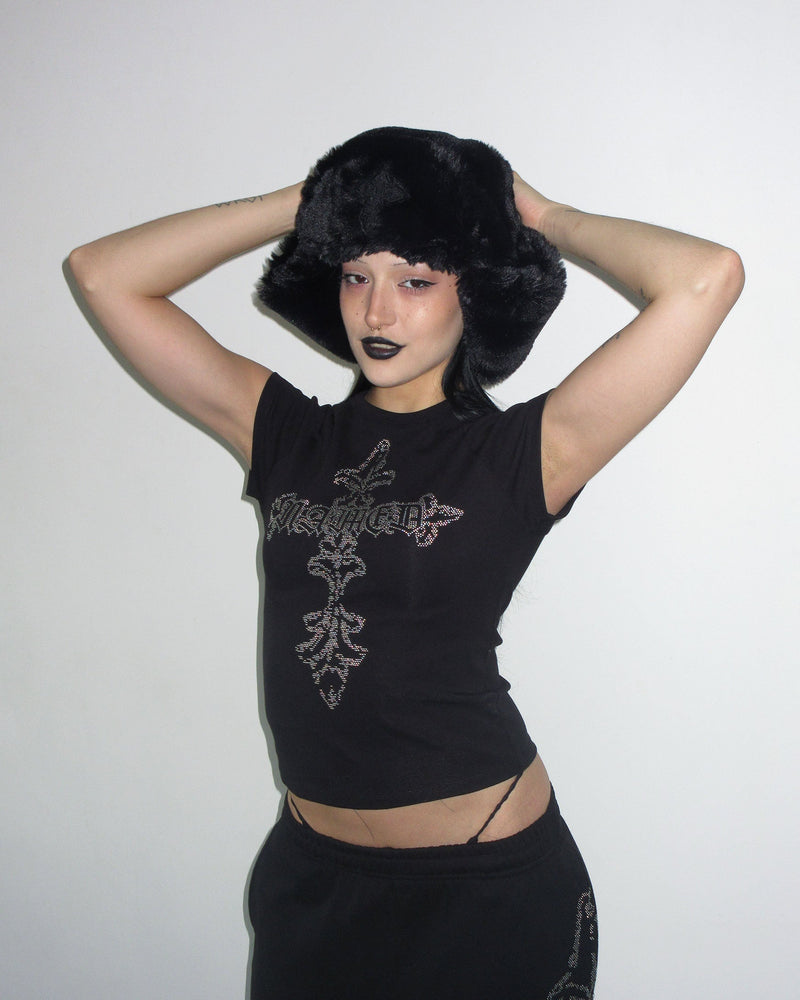 Model wears NAMED COLLECTIVE® FERAL STUDDED BABY TEE BLACK and poses against a plain white background.