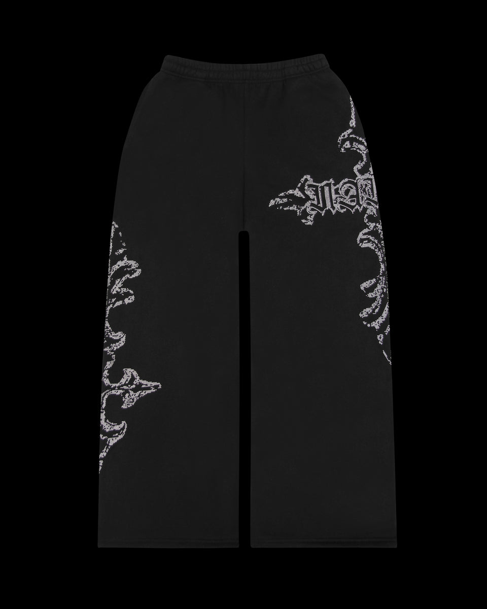 FERAL STUDDED OVERSIZED SWEATPANTS BLACK