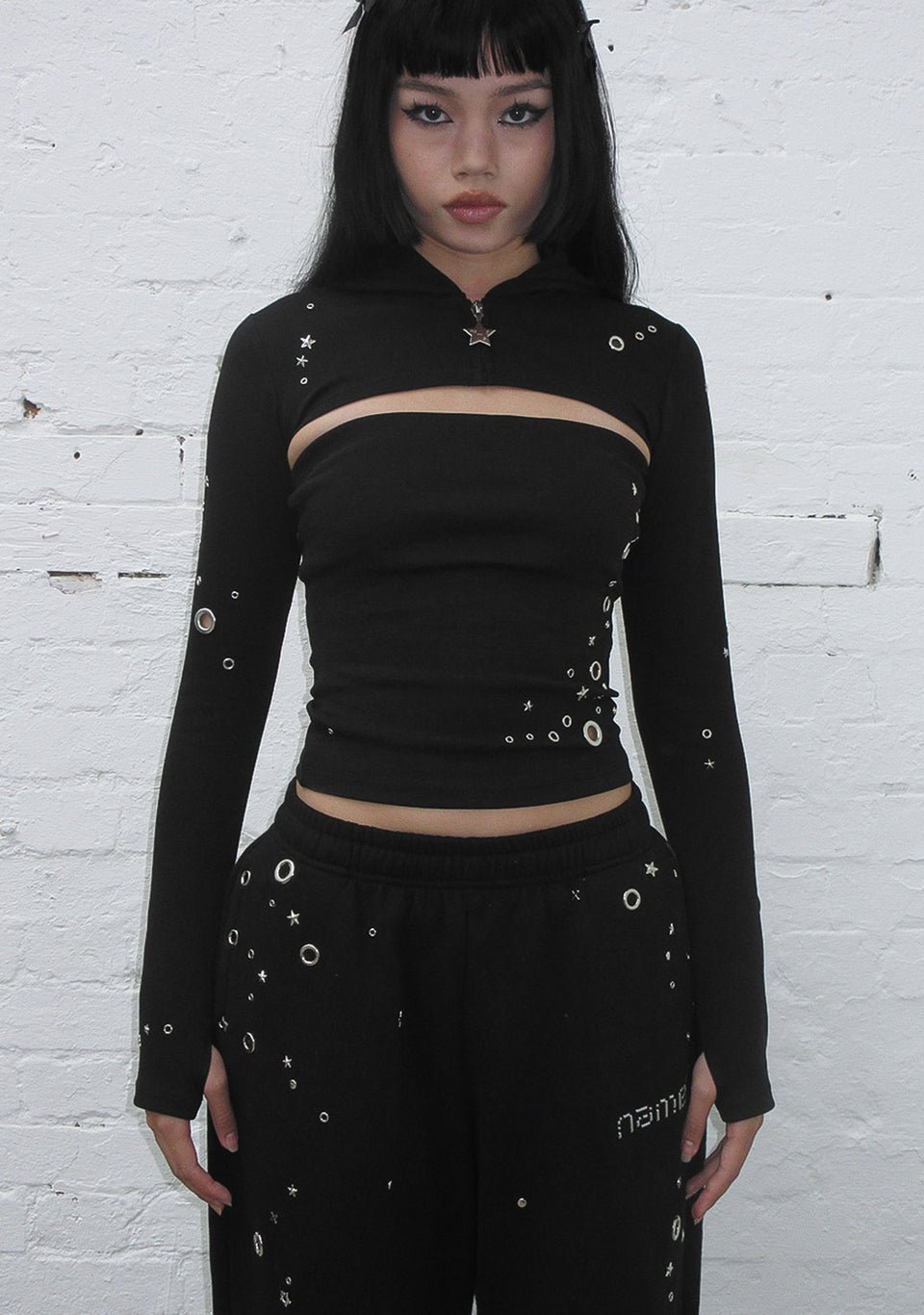 GLITCH EYELET ZIP HOODED SHRUG