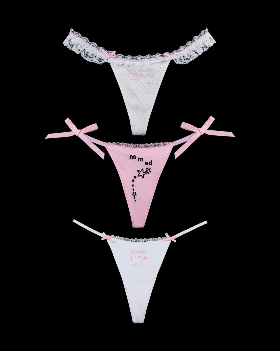 Three-pack MALFUNCTION THONG in baby pink and white by NAMED COLLECTIVE® shown on a solid black background.