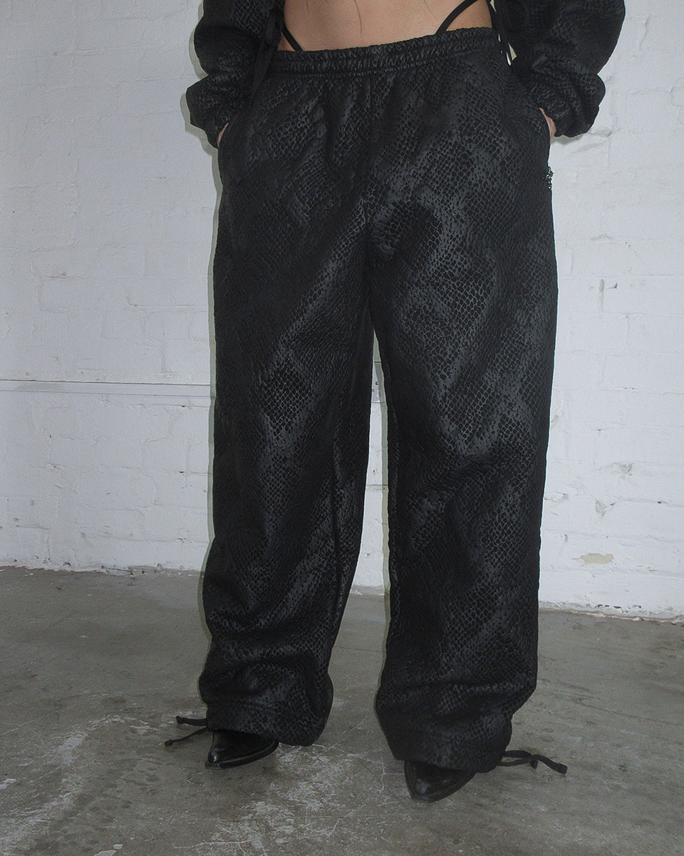 NOCTURNAL SNAKESKIN TEXTURED OVERSIZED SWEATPANTS BLACK