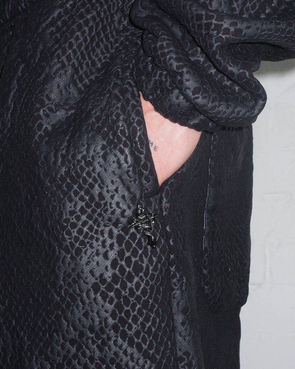 NOCTURNAL SNAKESKIN TEXTURED OVERSIZED SWEATPANTS BLACK