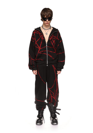 POISON RHINESTONE SWEATPANTS BLACK AND RED