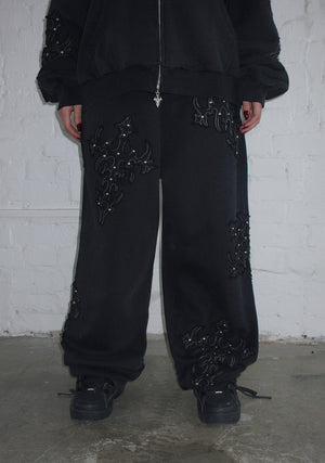 SINNER STUDDED OVERSIZED SWEATPANTS BLACK VINTAGE WASH