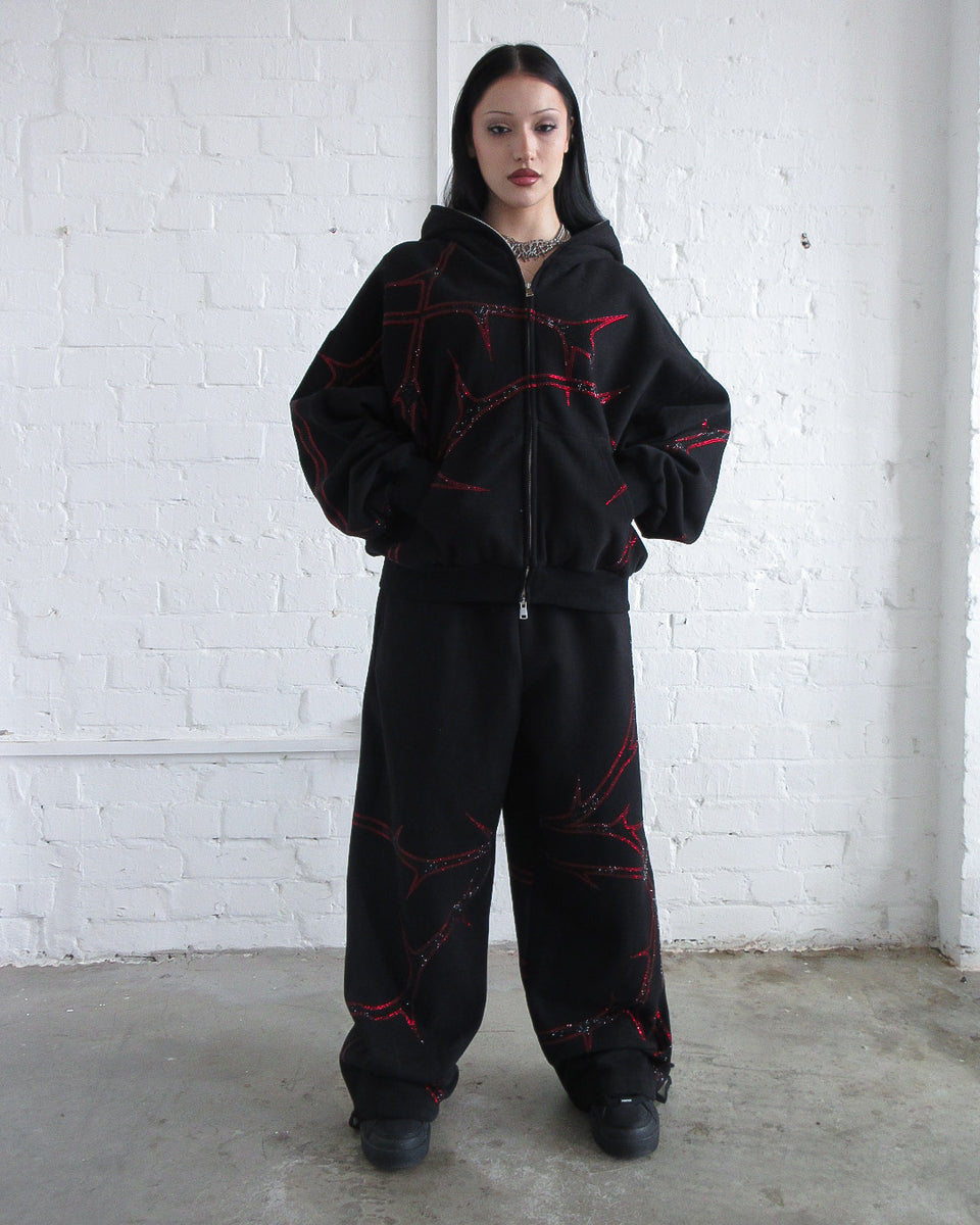 THORN RHINESTONE SWEATPANTS BLACK AND RED
