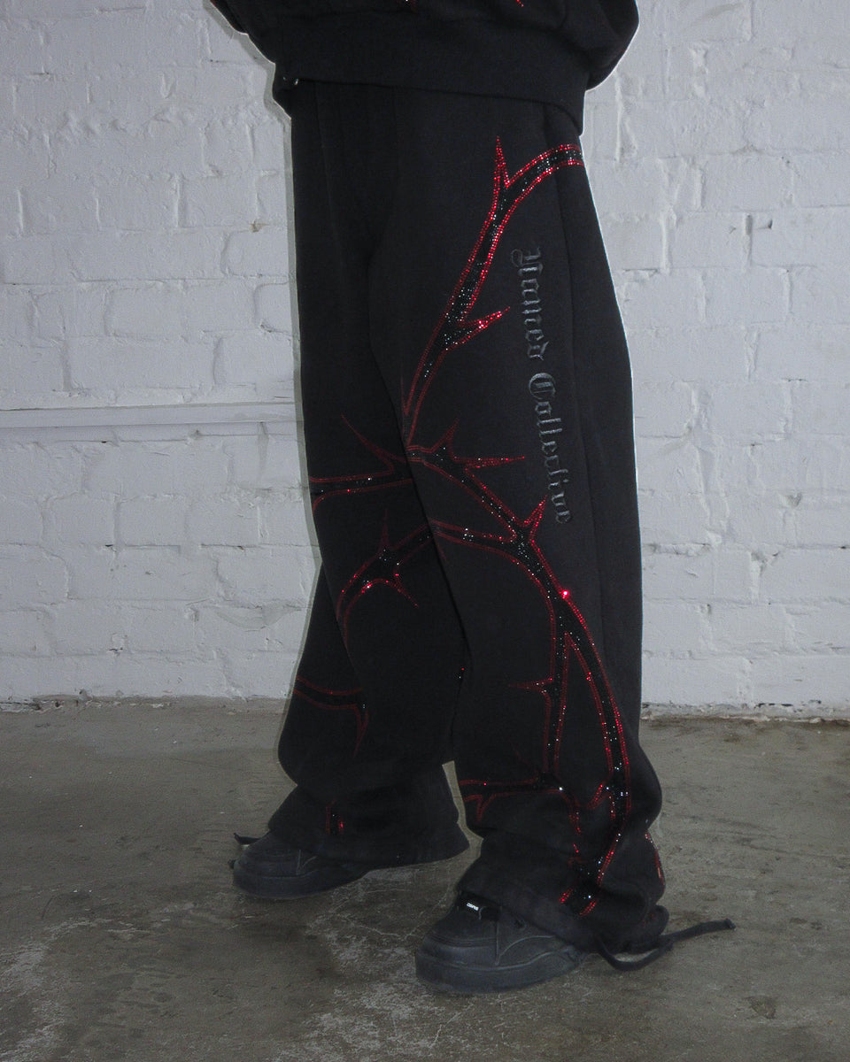 THORN RHINESTONE SWEATPANTS BLACK AND RED