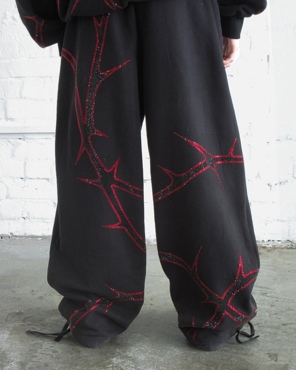 THORN RHINESTONE SWEATPANTS BLACK AND RED