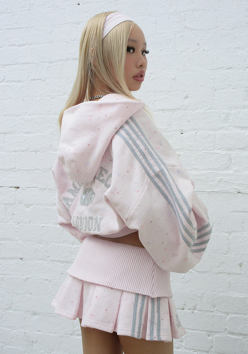 MALFUNCTION SPORTY PLEATED MINI SKIRT BABY PINK