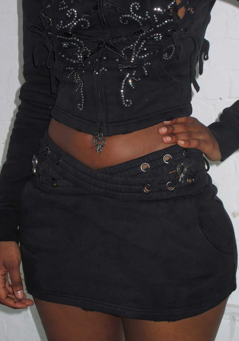 VENDETTA LACE UP MICRO SKIRT BLACK VINTAGE WASH
