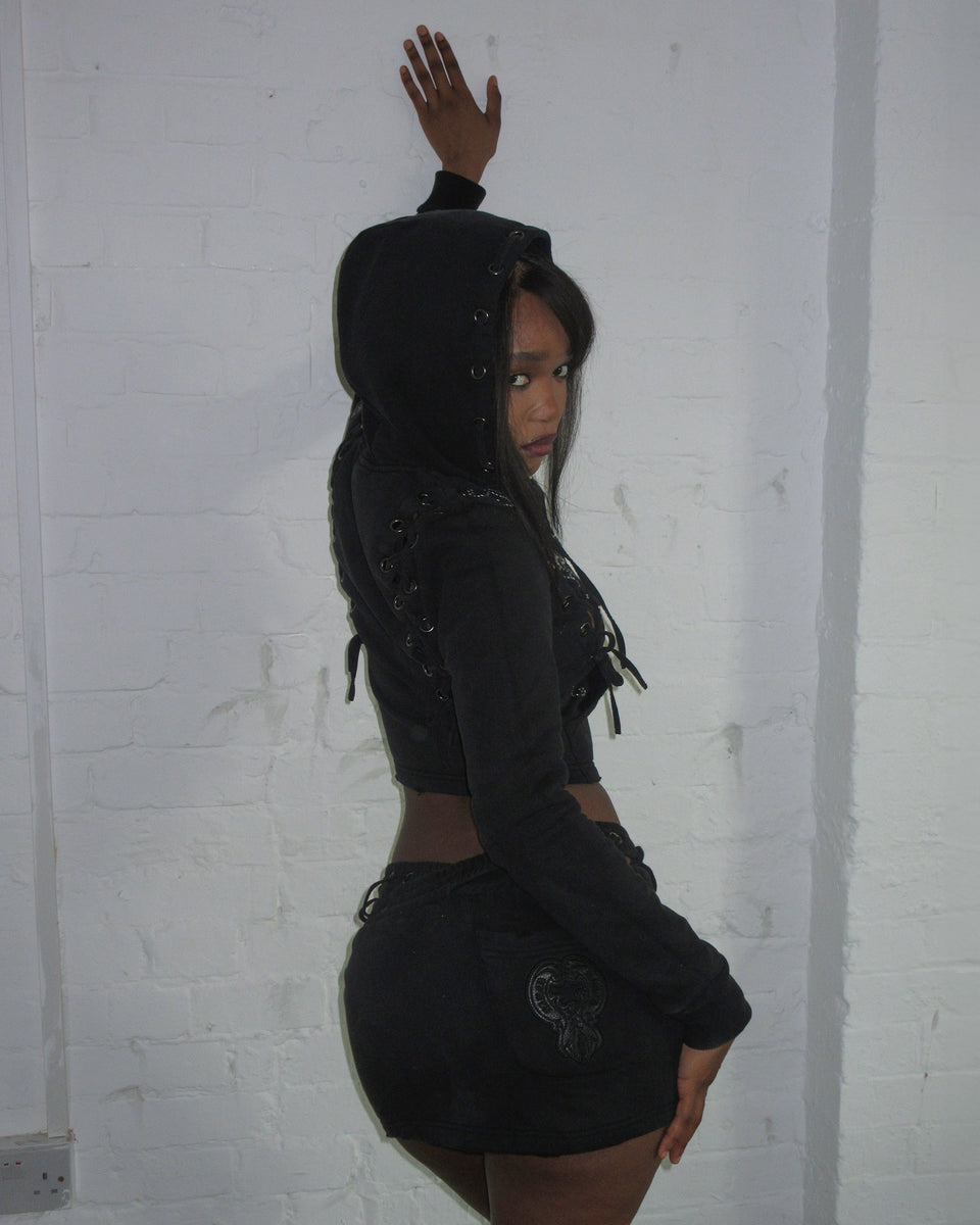 VENDETTA LACE UP MICRO SKIRT BLACK VINTAGE WASH