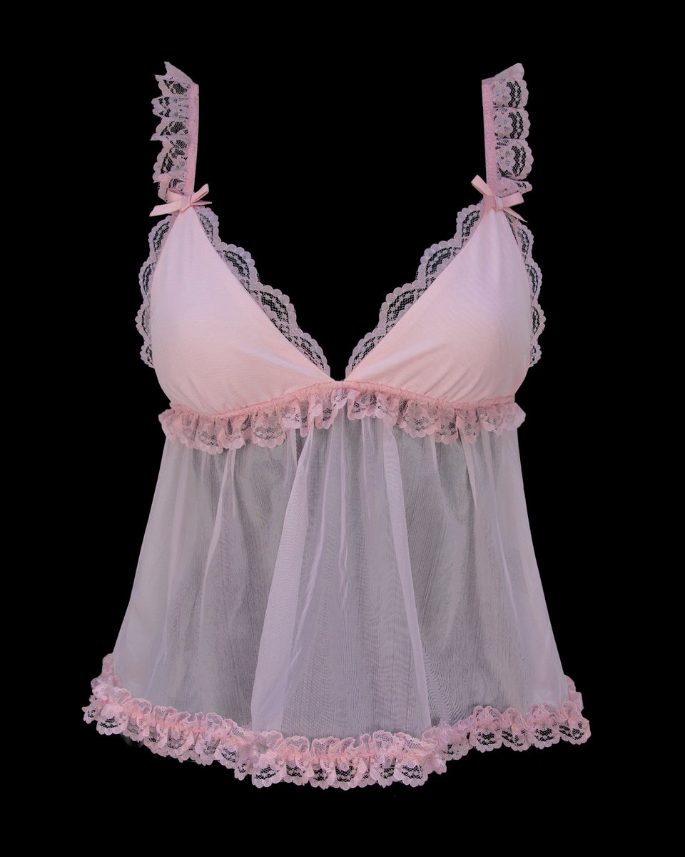The WHISPER SHEER MESH CAMI TOP by NAMED COLLECTIVE® is a baby pink cami with ruffle trim and adjustable straps.
